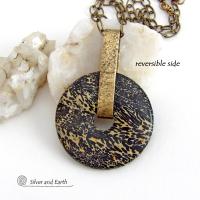 This one-of-a-kind pendant necklace features a stunning artistic jasper stone accented with a hand forged gold brass bail. This type of jasper is known for its intricate, natural patterns that resemble brushstrokes, landscapes, or abstract art. The stone in this piece has a natural bold dramatic pattern in hues of black and soft golden yellow with black streaks that resemble "feathery" dendrites. The design is modern and bold - yet classic and always in fashion. It can be worn by either a man or women. 