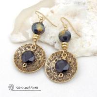 These handcrafted earrings feature gold brass dangles with a hand stamped texture accented with black onyx and golden-black tiger's eye gemstones and tiny gold brass beads. The stones have a faceted cut which casts off a beautiful natural sparkle and shine. They have a modern, elegant boho chic style that looks great dressed up or down.