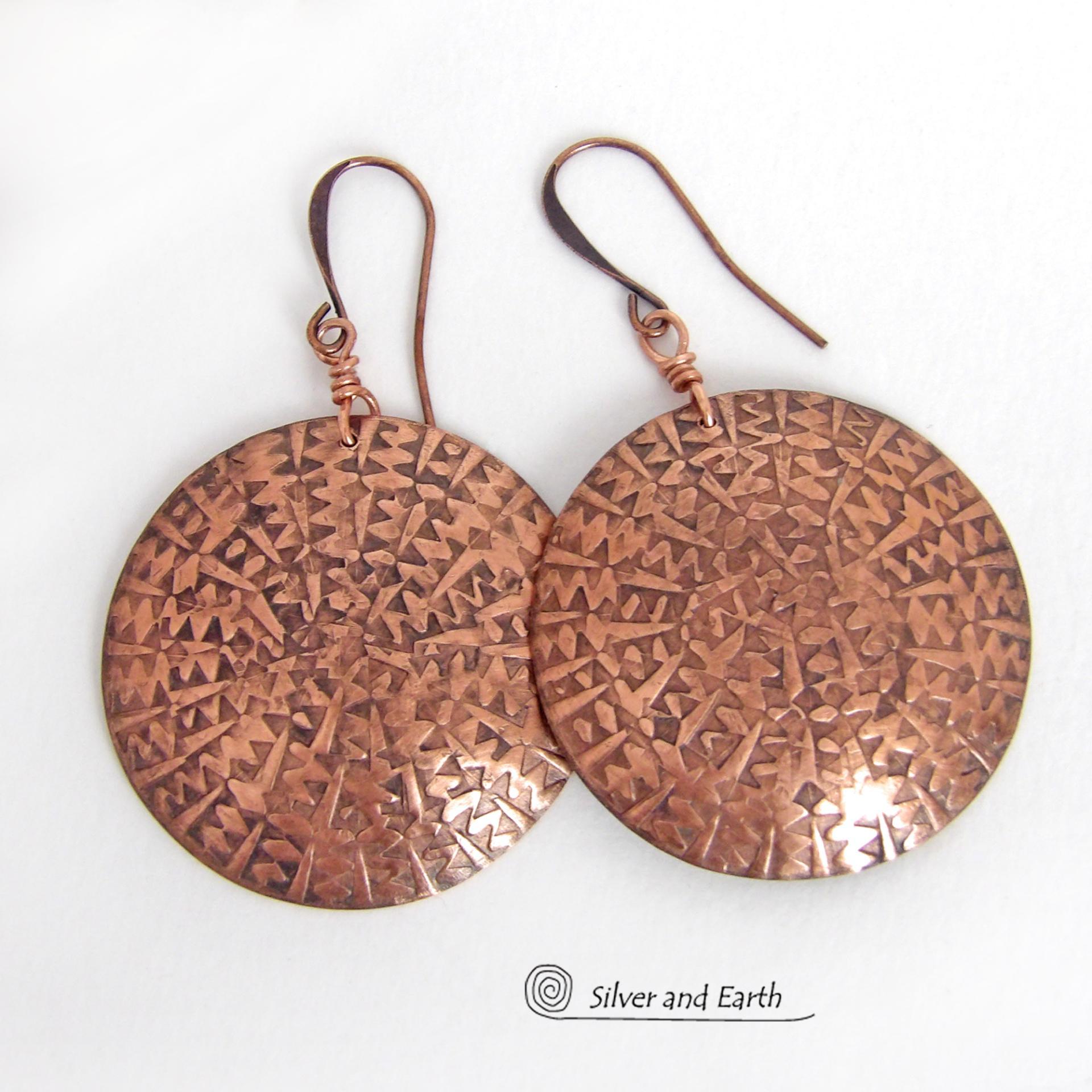 Big, bold and dramatic - these handmade copper earrings will make a statement. Unique and versatile, they'll look great with all wardrobe styles. They feature large copper circles with an intricate hand stamped texture and oxidized finish.