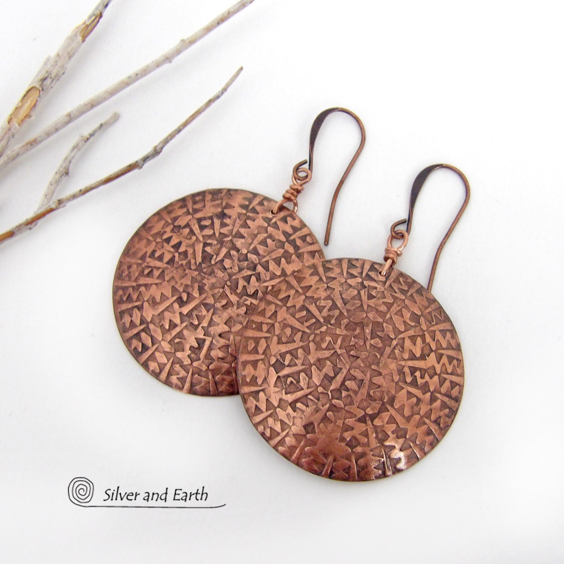 Big, bold and dramatic - these handmade copper earrings will make a statement. Unique and versatile, they'll look great with all wardrobe styles. They feature large copper circles with an intricate hand stamped texture and oxidized finish.