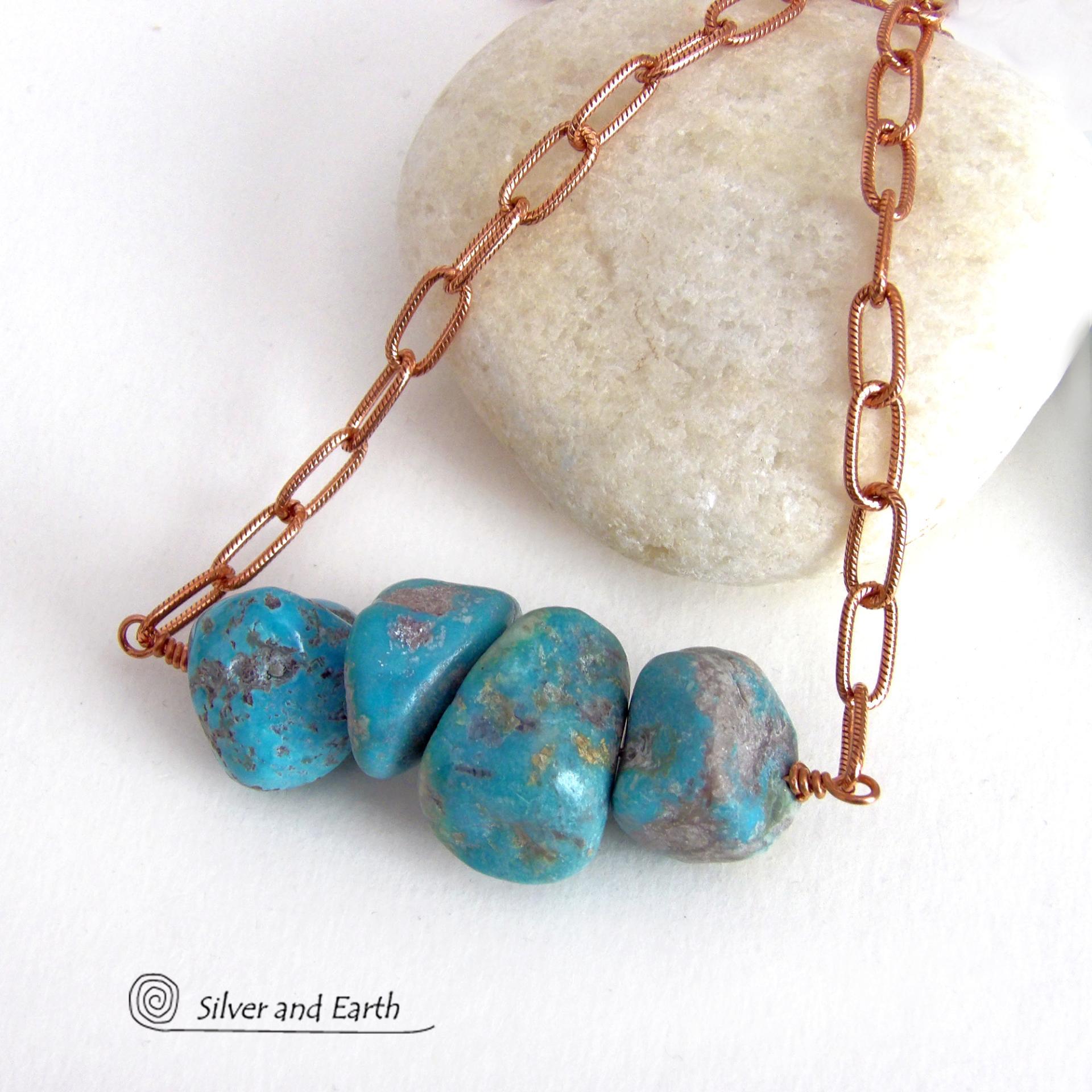 This chunky turquoise necklace features big, organically-shaped nuggets of genuine natural turquoise accented with a copper link chain. The turquoise is a stunning shade of blue - reminiscent of the lovely blue skies here in the American Southwest. Unique and one-of-a-kind, it will make a bold statement. Perfect for women that love bold unique jewelry made with natural stones. Handmade in the USA by Silver and Earth Jewelry. 
