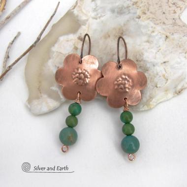 These hand forged copper flower earrings are accented with a stack of dangling turquoise stones. They have an earthy, whimsical charm and will make a great gift for nature / flower lovers and couples celebrating their seventh wedding anniversary. Copper is the traditional choice for this anniversary. Handmade in the USA by Silver and Earth Jewelry. 