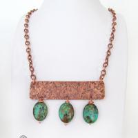 Gorgeous African turquoise stones were combined with handcrafted copper to create this bold statement necklace. I created the neck piece out of solid copper sheet and hammered the metal to create a rich, organic texture. The stones have beautiful hues of green, blue, brown, black and rust which contrast beautifully against the warm glow of the metal. The neck piece hangs from a solid copper chain with an intricate stamped design and is finished off with a sturdy, *easy-to-fasten* hook & eye closure.
