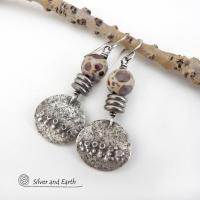 Small and petite, but full of unique earthy charm - these handcrafted sterling silver earrings have a funky edgy vibe. They feature rustic hammered small sterling silver dangles accented with natural asteroid jasper stones and a stack of stainless steel beads. This type of stone is known for its unique dotted matrix in earth-tone hues of brown, gray and tan. It's also known as chocolate ocean jasper because it's found on the shores of Madagascar where ocean jasper is also found.