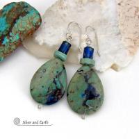 These earrings feature natural azurite-malachite gemstones with beautiful hues of royal blue and turquoise, along with subtle brown streaks. They are accented with a natural turquoise and azurite bead. Azurite-malachite is a combination of two different gemstones found blended together - compliments of Mother Nature. The rich blue color of the azurite is found intertwined with the deep, rich earthy green malachite. This "marriage" of stones is typically found in or around copper deposits. 