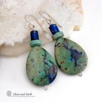 These earrings feature natural azurite-malachite gemstones with beautiful hues of royal blue and turquoise, along with subtle brown streaks. They are accented with a natural turquoise and azurite bead. Azurite-malachite is a combination of two different gemstones found blended together - compliments of Mother Nature. The rich blue color of the azurite is found intertwined with the deep, rich earthy green malachite. This "marriage" of stones is typically found in or around copper deposits. 