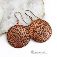 These handcrafted copper earrings have a beautifully detailed embossed cobblestone texture. Big and bold, they'll make a striking statement. Unique and versatile, they are lightweight and comfortable to wear and will look great with all wardrobe styles. Handmade in the USA by Silver and Earth Jewelry. Your choice of ear wire - copper or hypoallergenic niobium.
