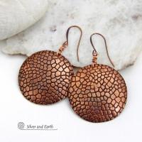 These handcrafted copper earrings have a beautifully detailed embossed cobblestone texture. Big and bold, they'll make a striking statement. Unique and versatile, they are lightweight and comfortable to wear and will look great with all wardrobe styles. Handmade in the USA by Silver and Earth Jewelry. Your choice of ear wire - copper or hypoallergenic niobium.