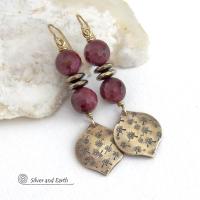 These handcrafted gold brass earrings have a hand stamped texture accented with micro-faceted deep burgundy mookaite gemstones and faceted hematite stone beads with an electroplated champagne gold tone finish. Mookaite is a unique, colorful type of jasper found at the Mooka Creek in Western Australia. These earrings have an elegant modern chic style that coordinates beautifully with all wardrobe types - dressed up or down. Handmade in the USA by Silver and Earth Jewelry.