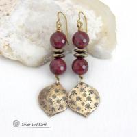 These handcrafted gold brass earrings have a hand stamped texture accented with micro-faceted deep burgundy mookaite gemstones and faceted hematite stone beads with an electroplated champagne gold tone finish. Mookaite is a unique, colorful type of jasper found at the Mooka Creek in Western Australia. These earrings have an elegant modern chic style that coordinates beautifully with all wardrobe types - dressed up or down. Handmade in the USA by Silver and Earth Jewelry.