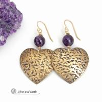 These handcrafted gold brass heart earrings have a hand stamped texture and are accented with faceted amethyst gemstones. Full of romantic charm, they'll make a great gift for someone special on Valentines' Day, a birthday, wedding anniversary -- or any day! They'll also make a great gift for someone born in February - amethyst is February's birthstone. Or a 6th wedding anniversary gift - amethyst is also the gemstone fo
