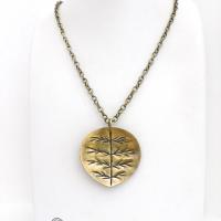 The perfect gift for nature lovers. This artisan handcrafted gold brass leaf pendant necklace has a modern earthy charm. It features a hand stamped texture pattern and comes on an 18" antiqued gold brass chain with lobster claw closure.