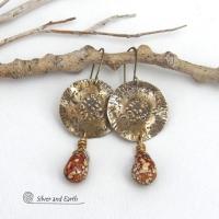 These handcrafted gold brass earrings have a modern, organic earthy style and are accented with natural brown spotted jasper gemstones. Bold, unique and one-of-a-kind - they make a striking statement with a modern edgy vibe. Perfect for women that love unique artisan handcrafted jewelry, earthy hammered textures and natural stones. Handmade in the USA by Silver and Earth Jewelry.