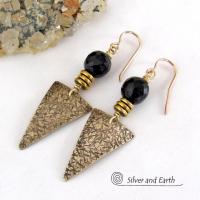 These gold brass triangle earrings have a hand stamped texture and are accented with black onyx gemstones above a stack of tiny brass beads. The stones have a faceted finish which gives off a natural sparkle and shine. Lightweight and comfortable to wear - they have a modern chic contemporary style that coordinates well with all wardrobes types. Handmade in the USA by Silver and Earth Jewelry.