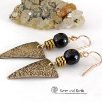 These gold brass triangle earrings have a hand stamped texture and are accented with black onyx gemstones above a stack of tiny brass beads. The stones have a faceted finish which gives off a natural sparkle and shine. Lightweight and comfortable to wear - they have a modern chic contemporary style that coordinates well with all wardrobes types. Handmade in the USA by Silver and Earth Jewelry.