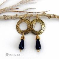 These handcrafted gold brass earrings have a hand stamped texture and are accented with teardrop shaped black onyx gemstones and brass beads. They have a modern chic vibe that coordinates beautifully with all wardrobe styles. Perfect for women that love to wear one of a kind artisan handcrafted jewelry. Handmade in the USA by Silver and Earth Jewelry. Total length of approximately 2-1/4" from top of brass ear wires and 1” at widest point. 