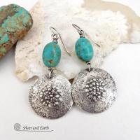 These handcrafted earrings feature natural turquoise nuggets accented with round sterling silver dangles with a rustic hammered and stamped texture. The stones are a gorgeous shade of turquoise with a subtle natural copper matrix. They have a modern, earthy organic style with a touch of southwestern flair.
