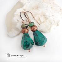 Natural chunky African turquoise gemstones are accented with copper beads and smaller African turquoise beads in these modern boho earrings. The stones on the bottom have an organic faceted cut. They'll make a great gift for anyone that loves natural stone jewelry - or a nice addition to your own jewelry wardrobe.