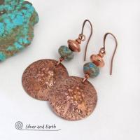 These earrings feature round copper dangles with a rustic, organic hammered texture accented with faceted calsilica jasper stones and brushed satin copper beads. The stones have a pretty blue hue combined with an earthy brown matrix. They have a modern style with a subtle bohemian flair that works well with all wardrobe types. They'll make a great gift for couples celebrating their 7th wedding anniversary --- copper is the traditional choice for this anniversary. 