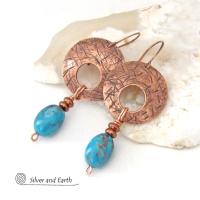 These handcrafted copper earrings have a hand stamped texture and are accented with natural turquoise stones and tiny copper beads. The turquoise is a beautiful shade of blue with an earthy, natural copper matrix. These earrings have a modern style with a touch of boho flair. They'll make a great gift for couples celebrating their seventh wedding anniversary - copper is the traditional choice for this occasion. 