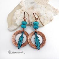 These handcrafted earrings feature round copper hoops with a hammered texture accented with a stack of turquoise beads and patina blue verdigris feathers. Lightweight and comfortable to wear - they'll add a touch of boho southwestern style to your wardrobe. Handmade in the USA by Silver and Earth Jewelry. 