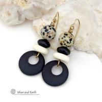 These handcrafted earrings feature matte black glass circle hoops accented with Dalmatian jasper gemstones, African bone and black glass beads. Unique and fun to wear, they have an earthy natural style with boho chic flair that makes a striking statement. They'll make a great gift for a natural stone lover - or a nice addition to your own jewelry wardrobe. 