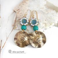 These earrings feature handcrafted gold brass dangles accented with beautifully detailed white and aqua blue Czech glass beads with gold highlights. Turquoise color glass beads were added for a pop of vibrant color. They have an earthy, modern boho feel that makes a striking statement. They'll make a great gift for a nature lover!