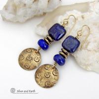 These handcrafted earrings feature round gold brass dangles with a hand stamped spiral texture. They are accented with natural lapis lazuli gemstones and faceted hematite stone beads with an electroplated champagne gold tone finish. The lapis stones are a rich shade of blue, along with natural gold pyrite inclusions. They have a modern chic, elegant style that coordinates beautifully with all wardrobe types - dressed up or down. Perfect for women that love unique artisan handcrafted jewelry