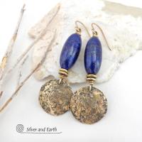 These handcrafted earrings feature beautiful long tube-shaped lapis lazuli gemstones accented with hammered gold brass dangles and tiny brass beads. The stones are a beautiful rich shade of blue with a sprinkling of natural sparkly pyrite inclusions. They have a modern, earthy chic elegance and can be worn with a variety of outfits - dressed up or down. Silver and Earth is a small business that makes beautiful handmade jewelry with high-quality natural materials. 