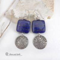 These earrings feature natural lapis lazuli gemstones accented with textured sterling silver dangles. The stones have a beautiful deep blue hue with natural pyrite inclusions. They are topped off with tiny pewter beads. The design is modern, classic, elegant and always in style. They'll coordinate beautifully with all wardrobe types. Handmade in the USA by Silver and Earth Jewelry. 