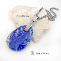This one-of-a-kind necklace features a gorgeous, natural lapis lazuli gemstone accented with a handcrafted sterling silver bail with a lightly hammered organic texture. The stone is a beautiful shade of blue with white inclusions, along with a sprinkling of natural sparkly pyrite inclusions. The stone is equally gorgeous on both sides, so I designed it to be reversible. (See all photos for alternate sides). Makes a great gift for a natural stone lover - or a nice addition to your own jewelry wardrobe.