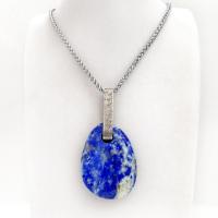 This one-of-a-kind necklace features a gorgeous, natural lapis lazuli gemstone accented with a handcrafted sterling silver bail with a lightly hammered organic texture. The stone is a beautiful shade of blue with white inclusions, along with a sprinkling of natural sparkly pyrite inclusions. The stone is equally gorgeous on both sides, so I designed it to be reversible. (See all photos for alternate sides). Makes a great gift for a natural stone lover - or a nice addition to your own jewelry wardrobe.
