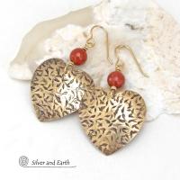 These handcrafted gold brass heart earrings have a hand stamped texture and are accented with faceted red jasper gemstones. They have a classic, modern style that coordinates beautifully with all wardrobe types. Full of romantic charm, they'll make a great gift for someone special on Mother's Day, Valentines' Day, a birthday, wedding anniversary -- or any day! 