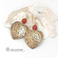 These handcrafted gold brass heart earrings have a hand stamped texture and are accented with faceted red jasper gemstones. They have a classic, modern style that coordinates beautifully with all wardrobe types. Full of romantic charm, they'll make a great gift for someone special on Mother's Day, Valentines' Day, a birthday, wedding anniversary -- or any day! 