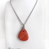 Simple and earthy - this pendant necklace features a natural red jasper gemstone with a wire wrapped sterling silver bail. The stone has a brick red hue with a natural matrix of beige streaks and dots. It has a modern minimalist appeal and is perfect for those that prefer simple, earthy jewelry. It has coordinating earrings which are sold separately. It makes a great gift for a natural stone lover - or a nice addition to your own jewelry wardrobe. Handmade in the USA by Silver and Earth Jewelry. 