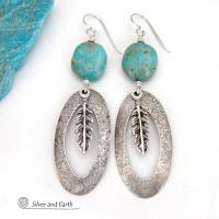 These handcrafted long oval sterling silver hoop earrings are accented with natural turquoise nuggets and dangling pewter feathers. They have a modern southwestern vibe and are perfect for anyone that loves the southwest style. 