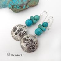 These handcrafted earrings feature sterling silver dangles with a hand stamped texture accented with a stack of round and uniquely "bow shaped" genuine natural turquoise stones. Bold and striking, they have an earthy modern rustic vibe with southwest style and flair that will look great with all types of outfits. Handmade in the USA, Silver and Earth is a small business that makes beautiful handmade jewelry with high quality materials. 