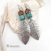 These handcrafted sterling silver feather earrings have a hand stamped texture and are accented with turquoise and bronzite stones which bring out the natural brown matrix in the turquoise stones. They have a native southwestern vibe that makes a bold statement. Perfect for anyone that loves the southwest style. Earrings measure 2-7/8" in length. Handmade exclusively by Silver and Earth. 