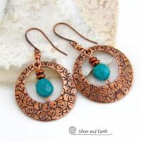 These handcrafted copper hoops have a hand stamped texture and are accented with faceted natural turquoise gemstones dangling in front. Perfect for all wardrobes types - they have a trendy modern style with a touch of southwestern flair. Perfect for women that love to make a bold statement and appreciate artisan handcrafted unique jewelry. Handmade in the USA by Silver and Earth Jewelry. Your choice of ear wires - copper or hypoallergenic niobium. 