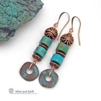 These handmade earrings feature natural turquoise stones accented with copper beads and organically shaped "rings" of copper with a soft turquoise patina finish. They have a modern chic bohemian style with a touch of exotic flair that makes a unique, bold statement. Handmade in the USA by Silver and Earth Jewelry.