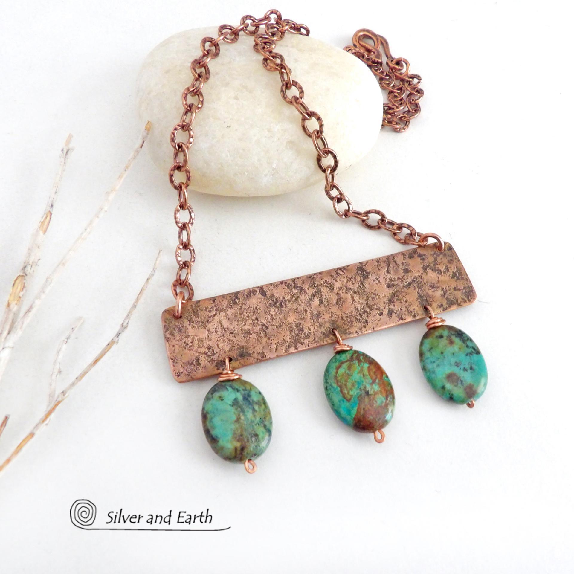 Gorgeous African turquoise stones were combined with handcrafted copper to create this bold statement necklace. I created the neck piece out of solid copper sheet and hammered the metal to create a rich, organic texture. The stones have beautiful hues of green, blue, brown, black and rust which contrast beautifully against the warm glow of the metal. The neck piece hangs from a solid copper chain with an intricate stamped design and is finished off with a sturdy, *easy-to-fasten* hook & eye closure.