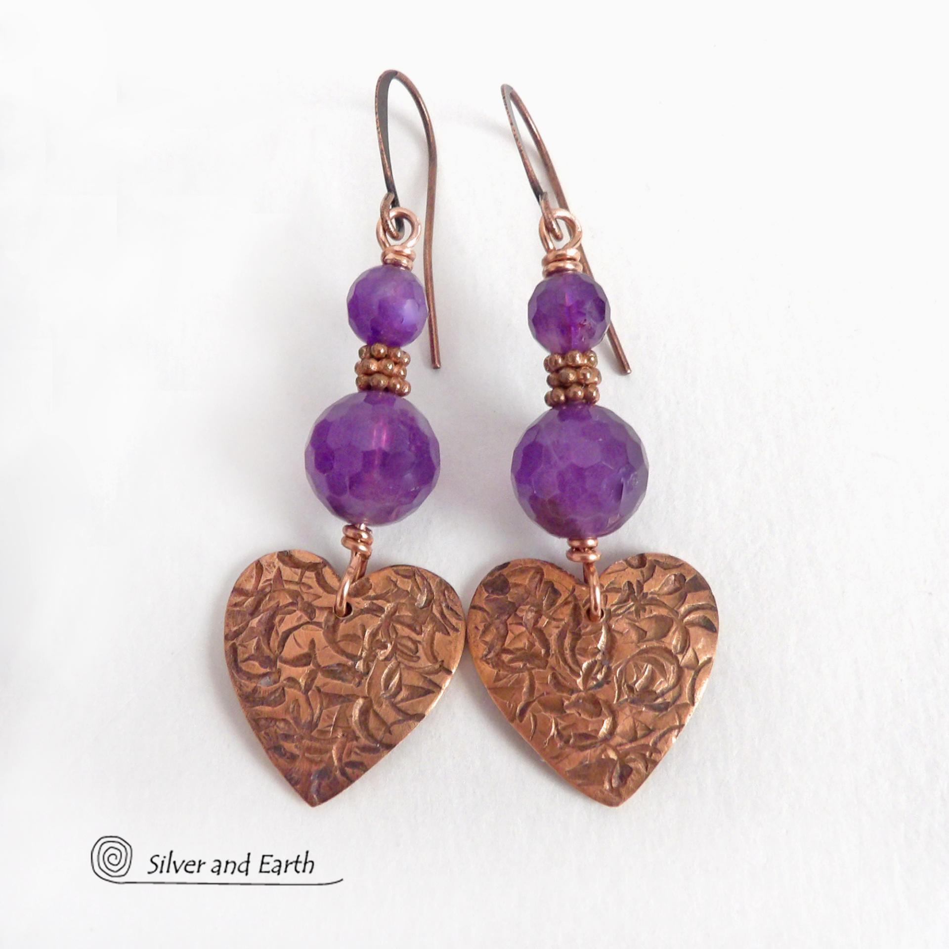 These handcrafted copper heart dangle earrings have a hand stamped texture and are accented with genuine purple amethyst gemstones with a faceted finish and tiny copper beads. Modern, classic and elegant - the style is always in fashion. The perfect gift for someone special on Valentine's Day or any day! They'll also make a great gift for someone with a February birthday or 6th anniversary - amethyst is the gemstone for either occasion. Or a 7th anniversary gift - copper is the traditional theme for this. 