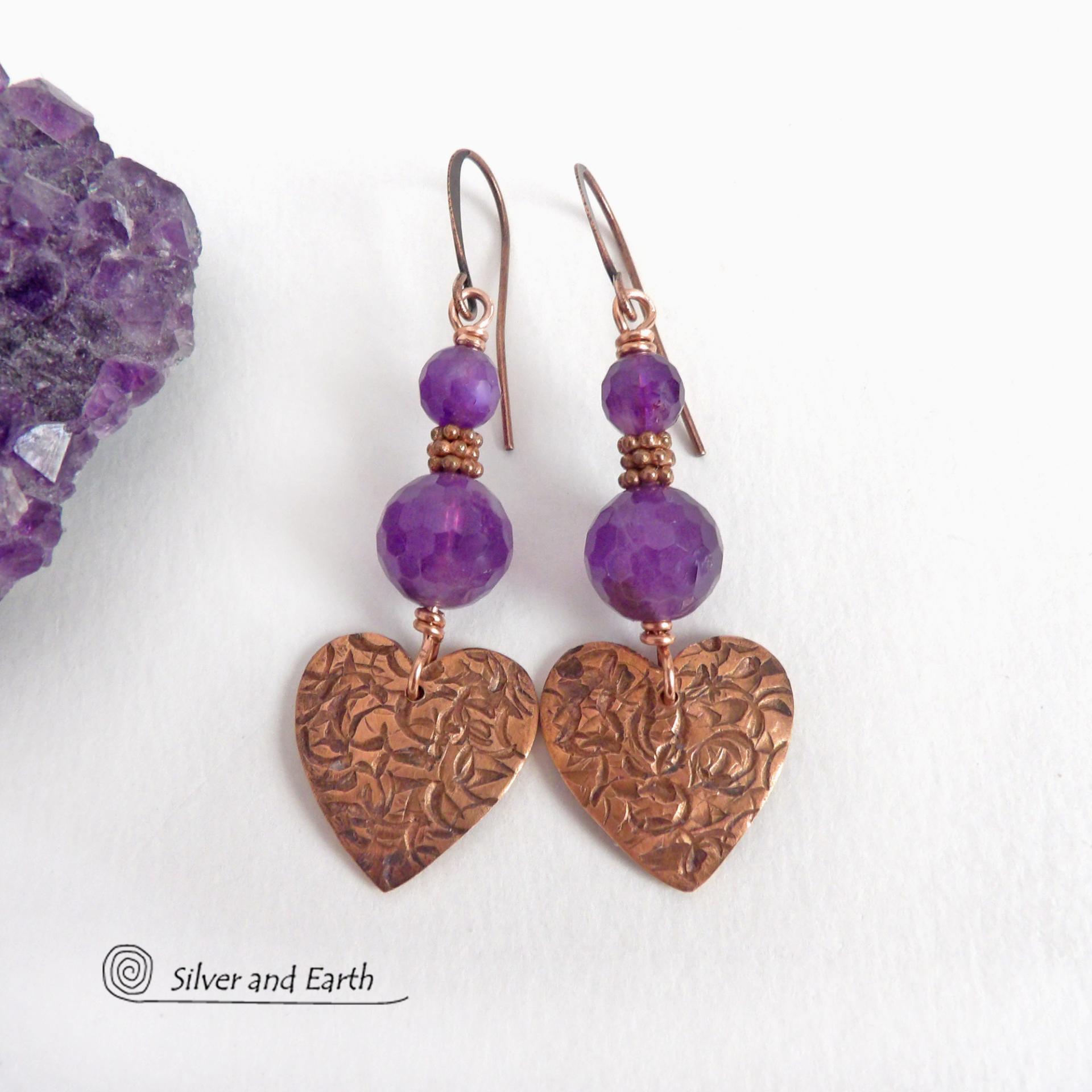 These handcrafted copper heart dangle earrings have a hand stamped texture and are accented with genuine purple amethyst gemstones with a faceted finish and tiny copper beads. Modern, classic and elegant - the style is always in fashion. The perfect gift for someone special on Valentine's Day or any day! They'll also make a great gift for someone with a February birthday or 6th anniversary - amethyst is the gemstone for either occasion. Or a 7th anniversary gift - copper is the traditional theme for this. 