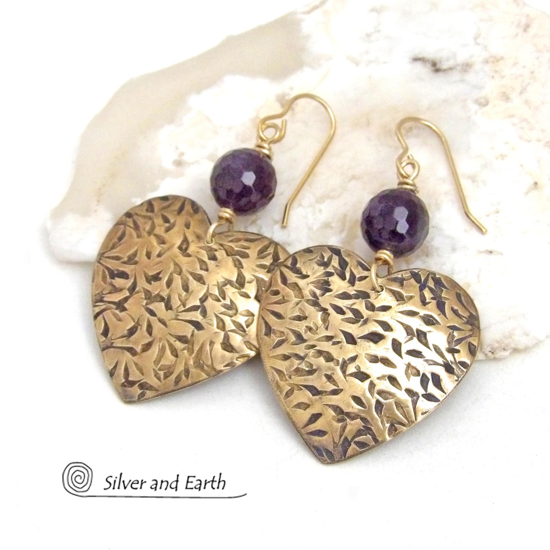 These handcrafted gold brass heart earrings have a hand stamped texture and are accented with faceted amethyst gemstones. Full of romantic charm, they'll make a great gift for someone special on Valentines' Day, a birthday, wedding anniversary -- or any day! They'll also make a great gift for someone born in February - amethyst is February's birthstone. Or a 6th wedding anniversary gift - amethyst is also the gemstone fo