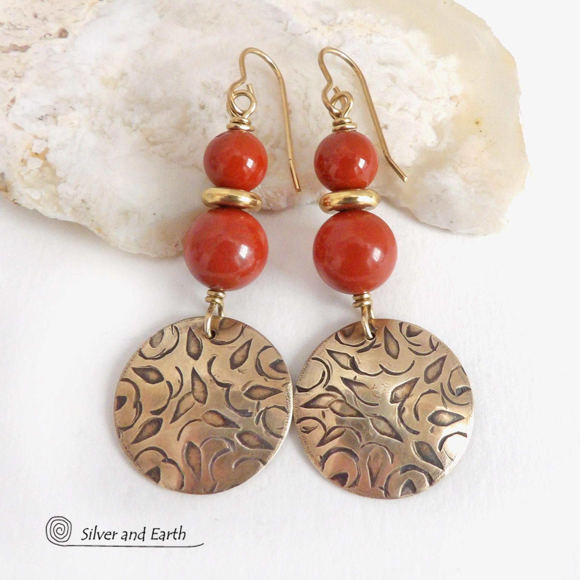 These handcrafted earrings have an elegant, modern chic style that coordinates beautifully with all wardrobe types -- dressed up or down. They feature gold brass dangles with a hand stamped texture accented with a stack of red jasper gemstones and shiny brass beads. They'll make a great gift for a natural gemstone lover - or a nice addition to your own jewelry wardrobe. Handmade in the USA by Silver and Earth jewelry.