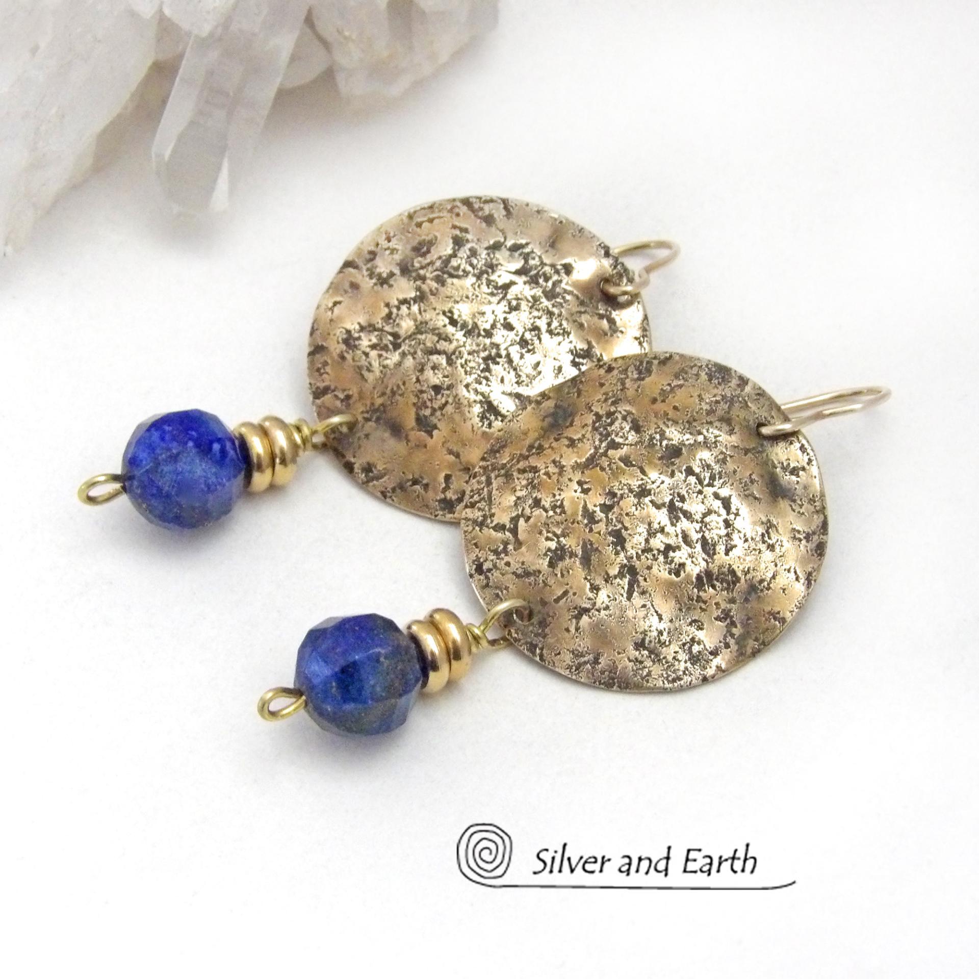 These handcrafted gold brass earrings have a lightly hammered organic texture accented with dangling blue lapis lazuli gemstones and tiny brass beads. They have a modern chic style that coordinates beautifully with all wardrobe styles - dressed up or down. They'll make a great gift for couples celebrating their 9th or 21st wedding anniversary. Brass is the traditional choice for a 21st anniversary and lapis is the gemstone for a 9th anniversary.