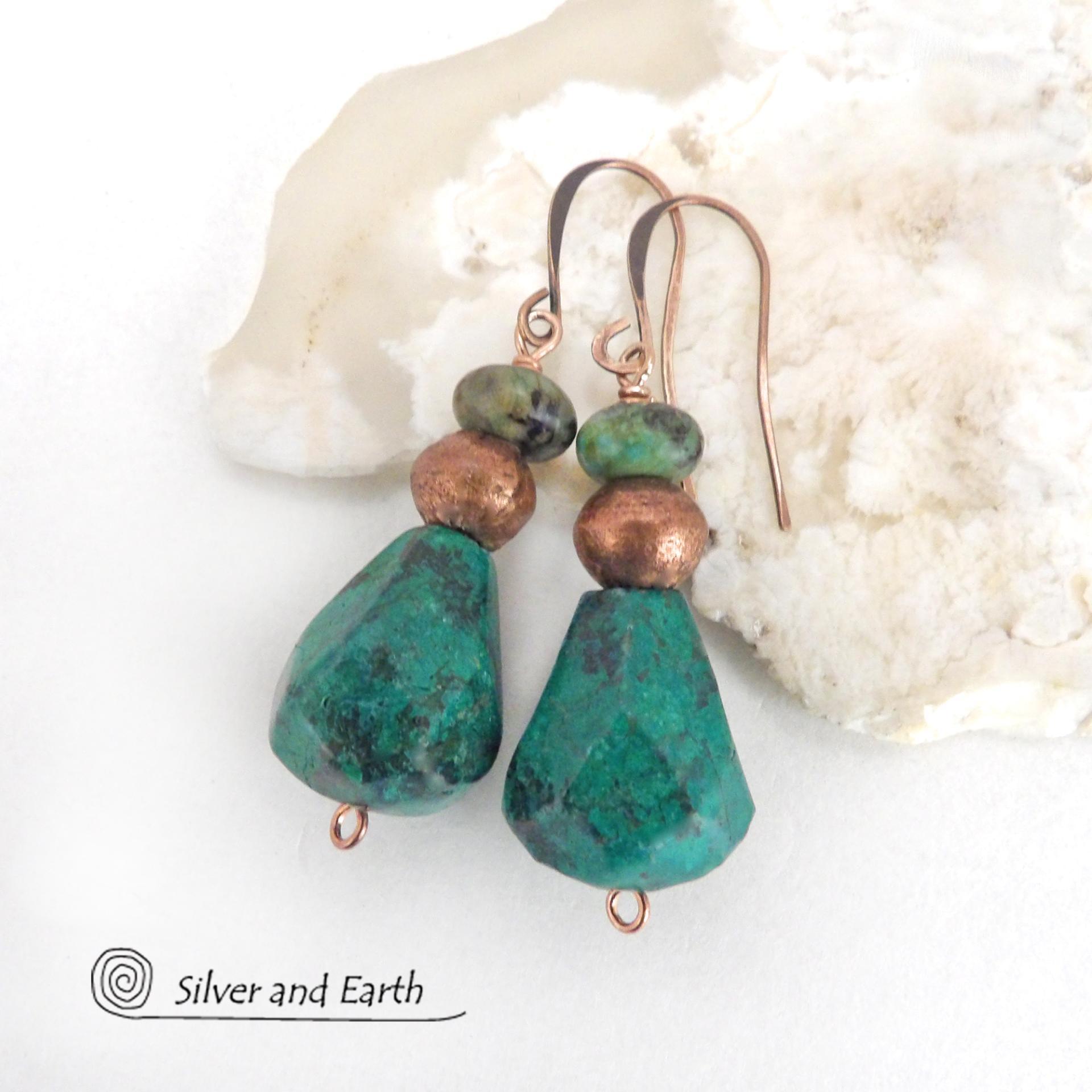 Natural chunky African turquoise gemstones are accented with copper beads and smaller African turquoise beads in these modern boho earrings. The stones on the bottom have an organic faceted cut. They'll make a great gift for anyone that loves natural stone jewelry - or a nice addition to your own jewelry wardrobe.
