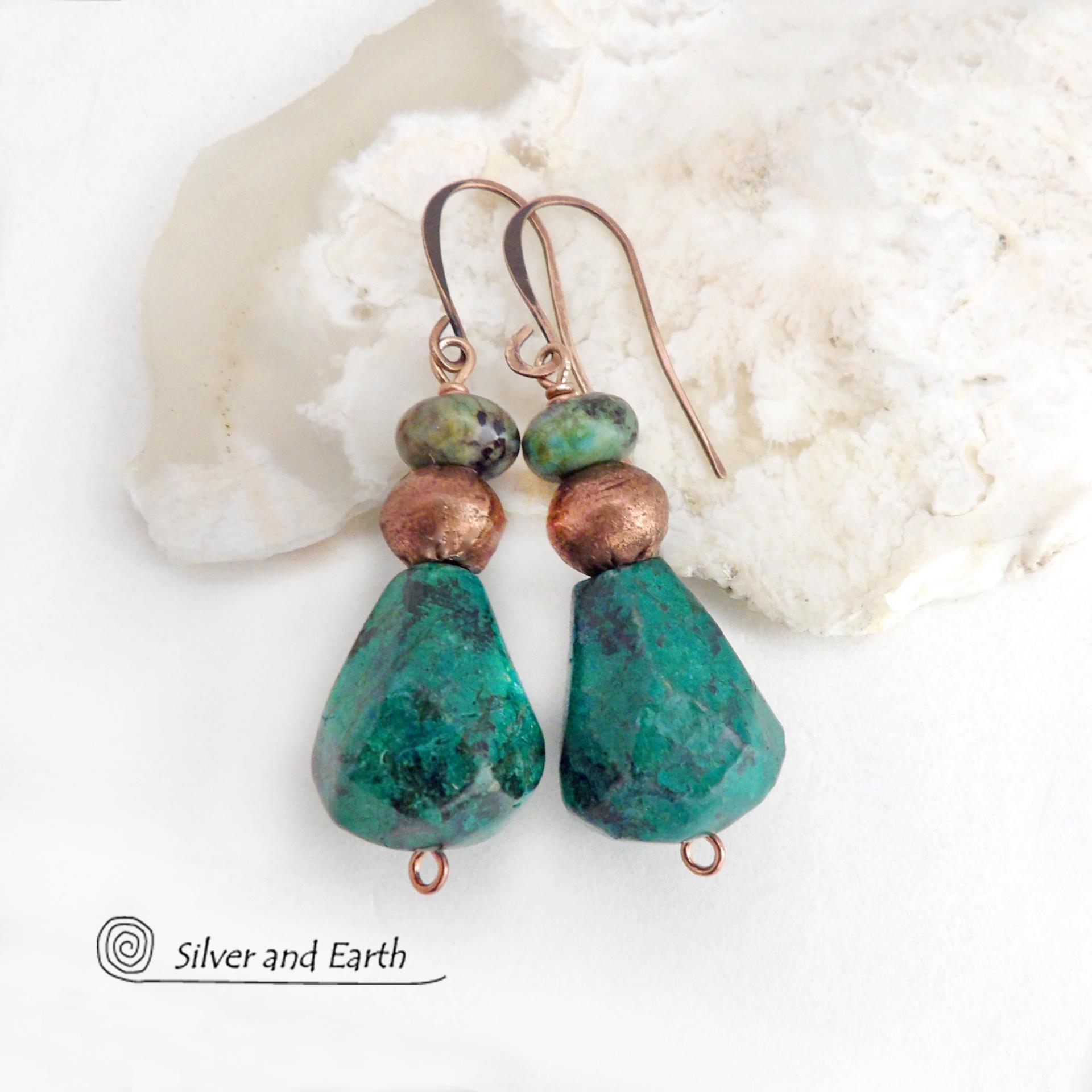 Natural chunky African turquoise gemstones are accented with copper beads and smaller African turquoise beads in these modern boho earrings. The stones on the bottom have an organic faceted cut. They'll make a great gift for anyone that loves natural stone jewelry - or a nice addition to your own jewelry wardrobe.