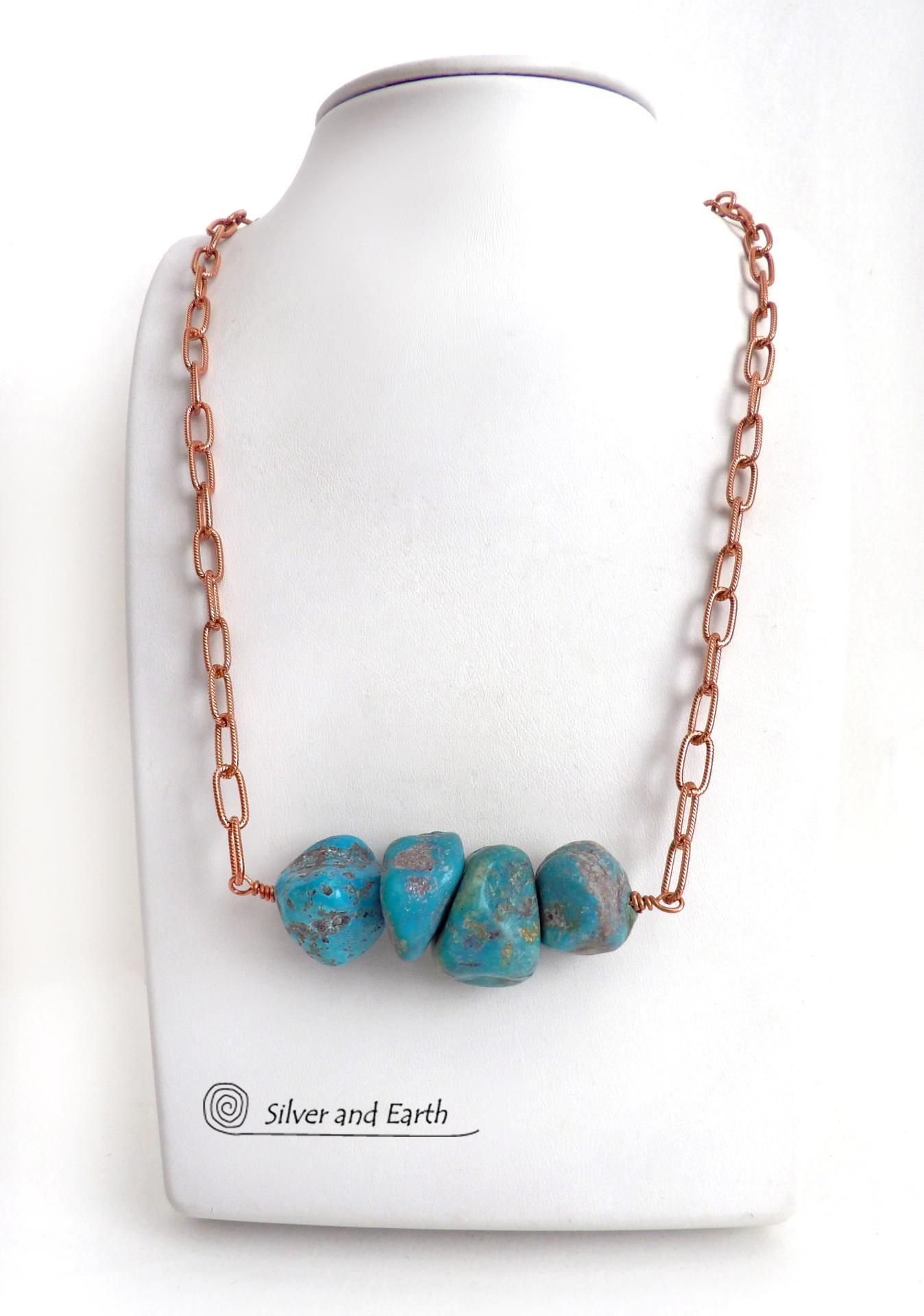This chunky turquoise necklace features big, organically-shaped nuggets of genuine natural turquoise accented with a copper link chain. The turquoise is a stunning shade of blue - reminiscent of the lovely blue skies here in the American Southwest. Unique and one-of-a-kind, it will make a bold statement. Perfect for women that love bold unique jewelry made with natural stones. Handmade in the USA by Silver and Earth Jewelry. 