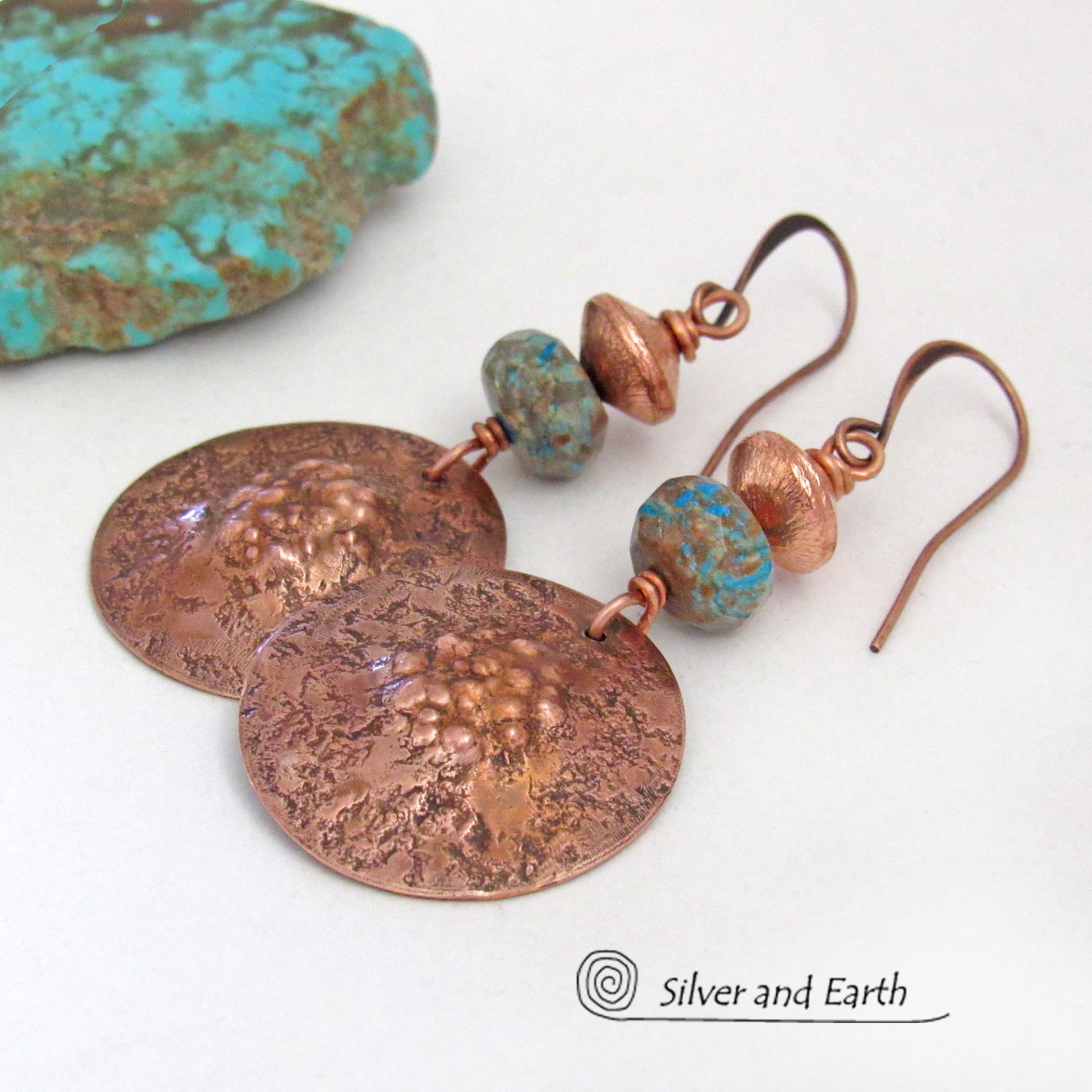 These earrings feature round copper dangles with a rustic, organic hammered texture accented with faceted calsilica jasper stones and brushed satin copper beads. The stones have a pretty blue hue combined with an earthy brown matrix. They have a modern style with a subtle bohemian flair that works well with all wardrobe types. They'll make a great gift for couples celebrating their 7th wedding anniversary --- copper is the traditional choice for this anniversary. 